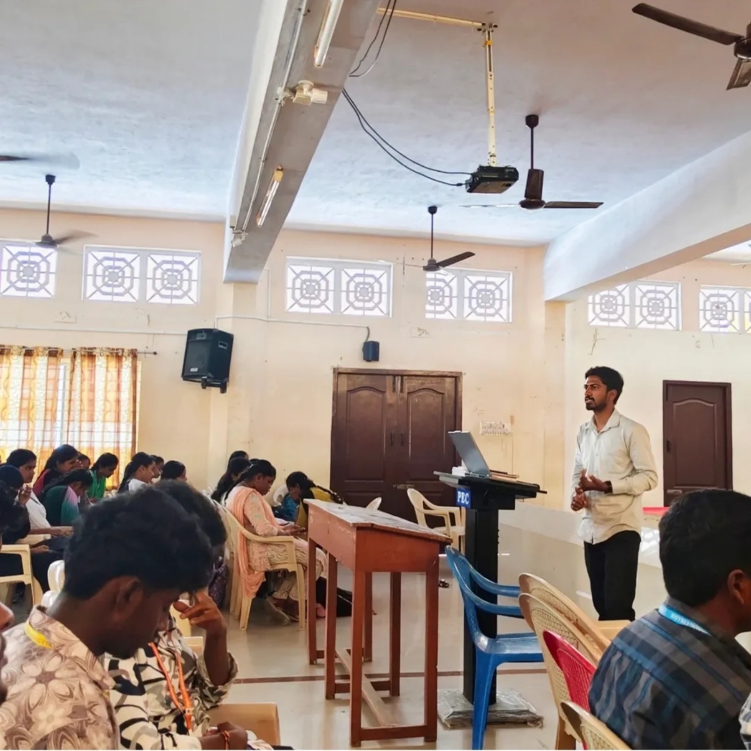 Codexaon trainer guiding learners through a classroom exercise